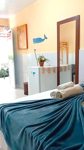 Standaard driepersoonskamer | Een minibar, gratis wifi