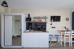 Fridge, stovetop, cookware/dishes/utensils - Marshall Gudauri Stylish Studio -By Wehost (Gudauri)