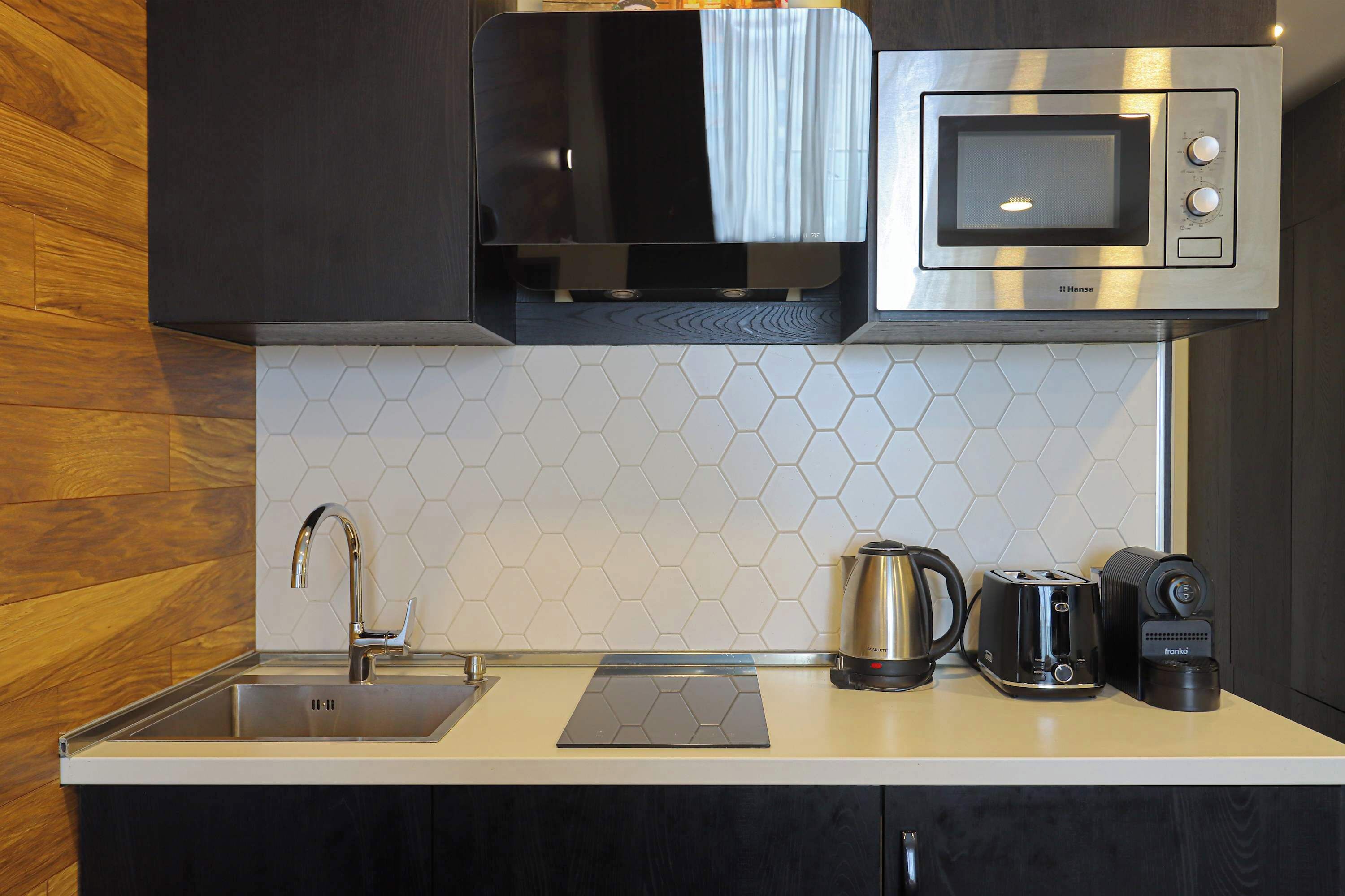 Fridge, stovetop, electric kettle, toaster