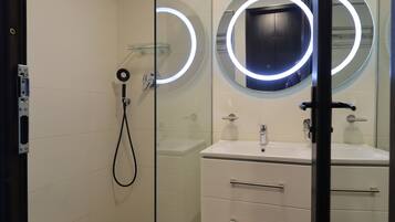 Shower, free toiletries, hair dryer, towels
