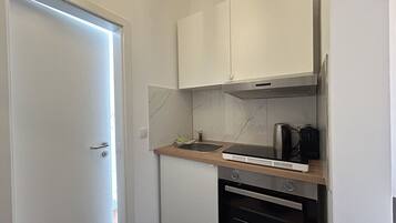 Ofen, Wasserkocher mit Kaffee-/Teezubehör, Toaster