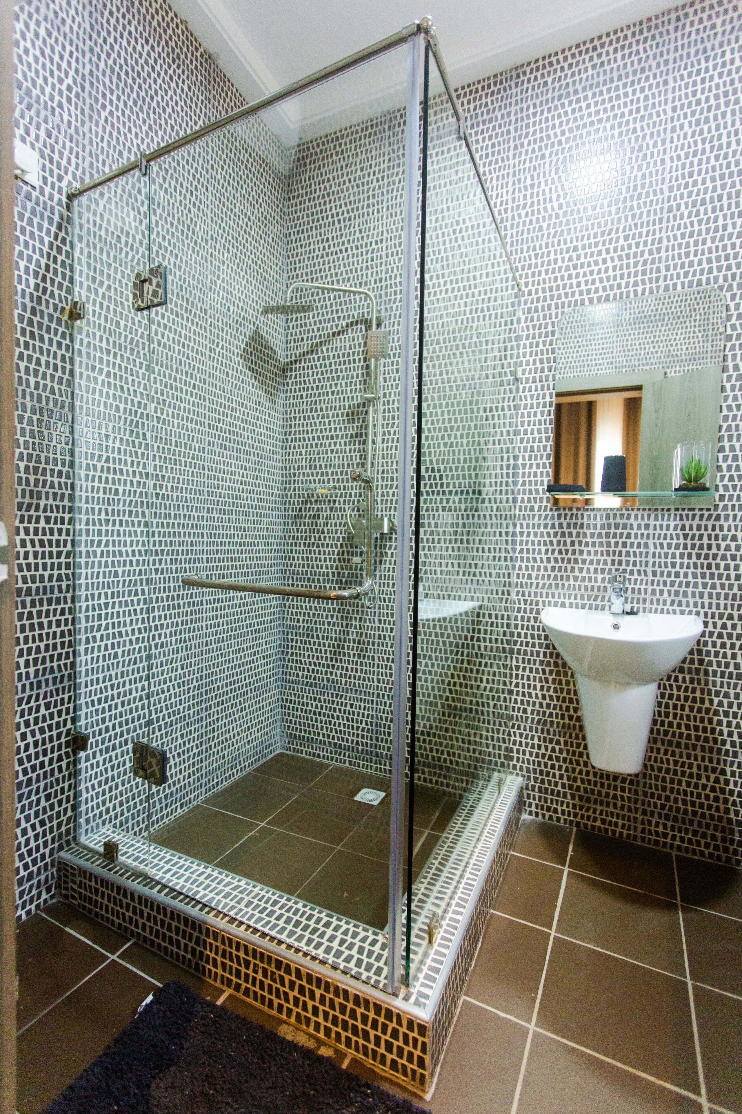 Shower, eco-friendly toiletries, towels, soap