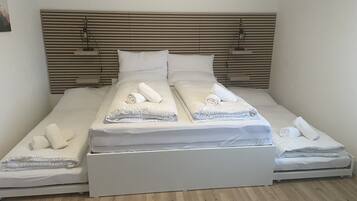 Desk, travel crib, free WiFi, bed sheets