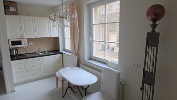 Quarto casal luxo, vista para o vale | Cozinha privada | Cadeirão de bebê