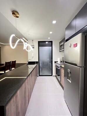 Fridge, microwave, oven, stovetop - Apartment in La Roma : Style + Comfort (Ciudad de México)