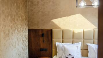 ห้องแฟมิลี่สตูดิโอสวีท | โต๊ะทำงาน, ผ้าม่านกันแสง, เตารีด/โต๊ะรีดผ้า, Wi-Fi ฟรี