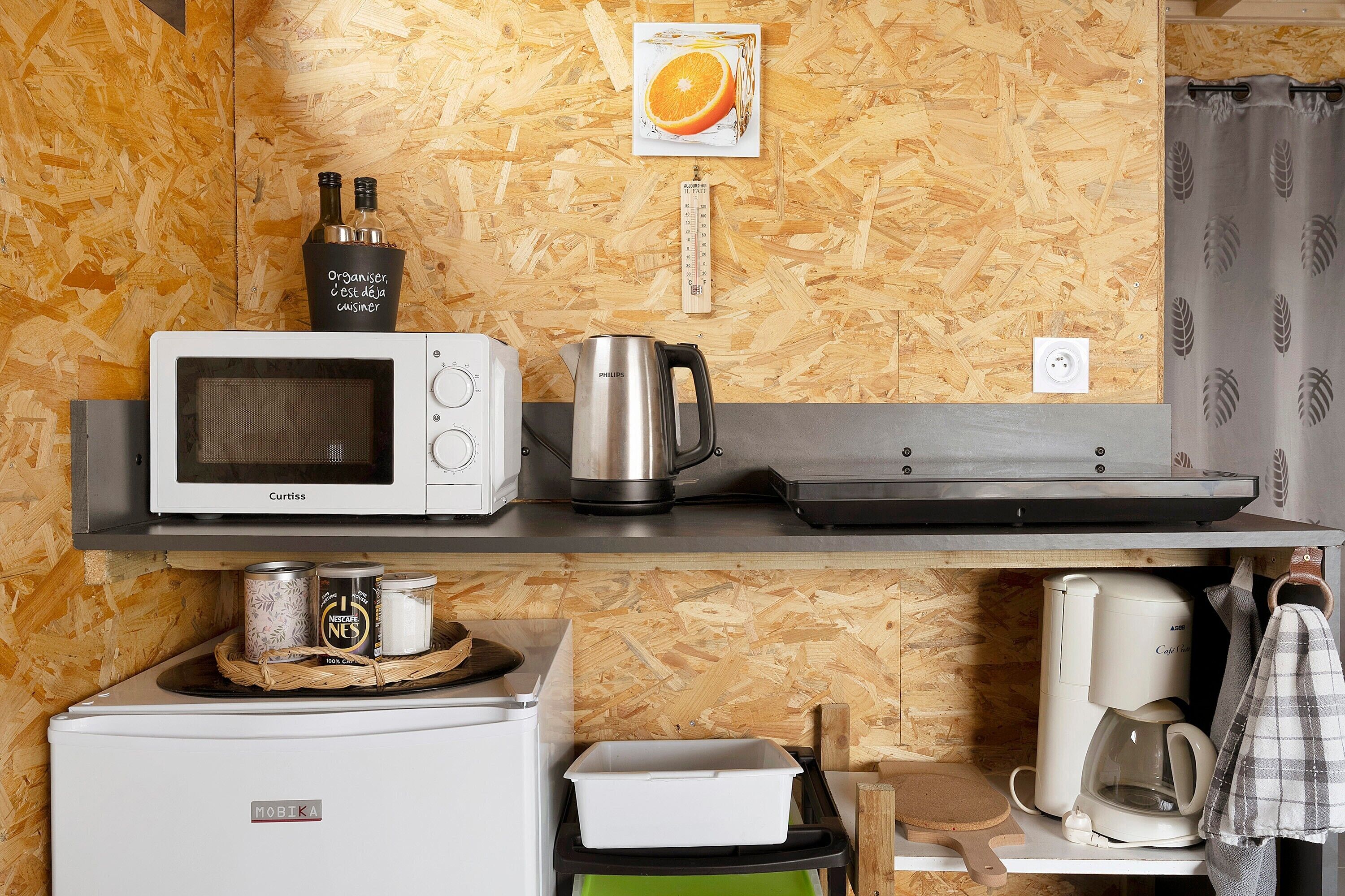 Fridge, microwave, stovetop, coffee/tea maker