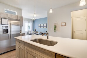 Fridge, microwave, oven, stovetop - Modern Townhome | Prime Location | Pup Friendly (Colorado Springs)