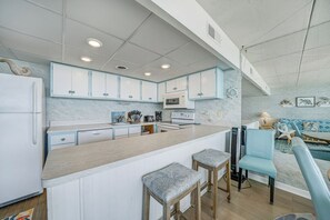 Coffee/tea maker, fridge, microwave, oven - Renovated 2nd floor condo by Seaside Vacations & Sales (Ocean City)