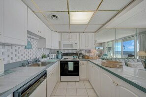 Fridge, microwave, oven, stovetop - Oceanfront condo near Jolly Rogers by Seaside Vacations & Sales (Ocean City)
