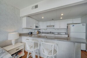 Fridge, microwave, oven, stovetop - Oceanfront escape with Outdoor Pool by Seaside Vacations & Sales (Ocean City)