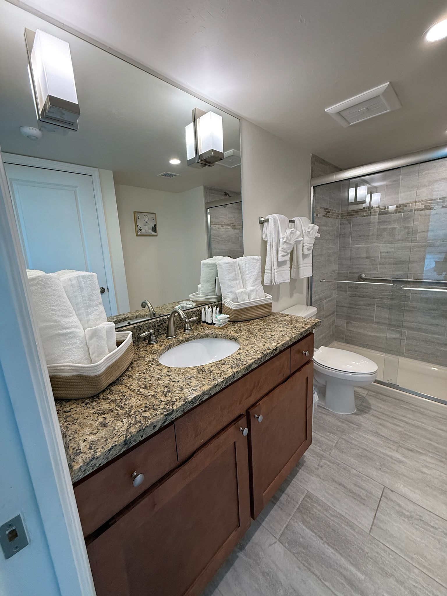 Hair dryer, towels, soap, toilet paper