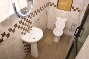 Standard Single Room | Bathroom | Shower, slippers, towels, soap - The Haven Luxury Guest House moyale (Moyale)