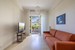Apartment, 2 Bedrooms, Pets allowed, Beach View | Living area | 30-inch TV with satellite channels - Next to the Beach by Wonderful Italy (Ospedaletti)