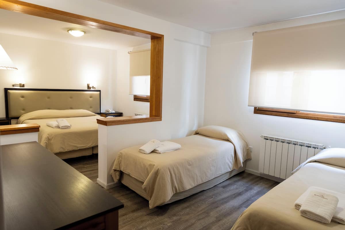 Family Quadruple Room | In-room safe, laptop workspace, blackout drapes, free WiFi