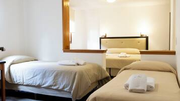 Family Quadruple Room | In-room safe, laptop workspace, blackout drapes, free WiFi