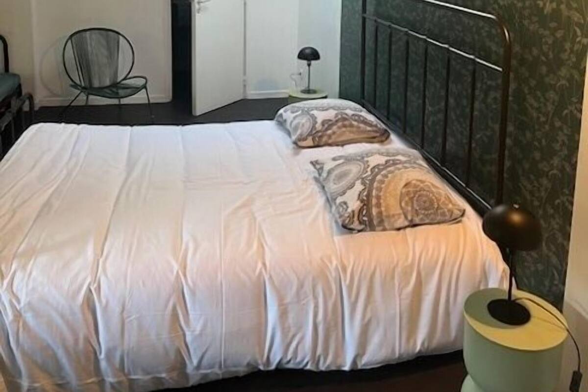 Habitación doble, varias camas, vista al jardín | Wifi gratis