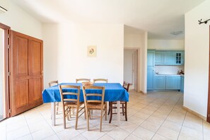 Apartment, 2 Bedrooms, Balcony, Garden View | Dining room - Sardinian Charm Surrounded by Nature (Budoni)
