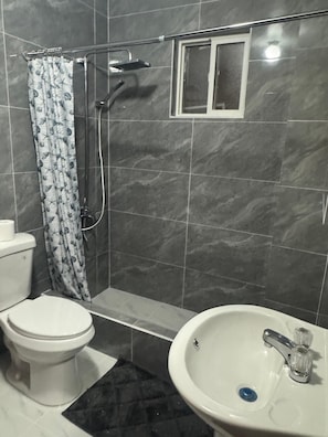 Shower, hair dryer, towels, soap - 3-bedroom apartment in wonderful Piti with AC across from the Beach! (Piti)