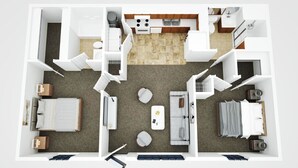 Un apartamento de dos habitaciones con cocina, comedor y sala de estar.