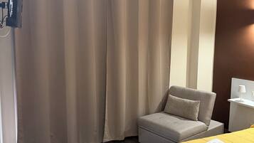 Triple Room, Balcony, Partial Sea View | In-room safe, blackout drapes, iron/ironing board, free WiFi