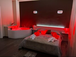 Suite, Balcony, City View | In-room safe, blackout drapes, iron/ironing board, free WiFi
