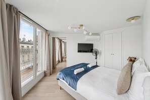 1 slaapkamer, een strijkplank/strijkijzer, reisbedje, wifi