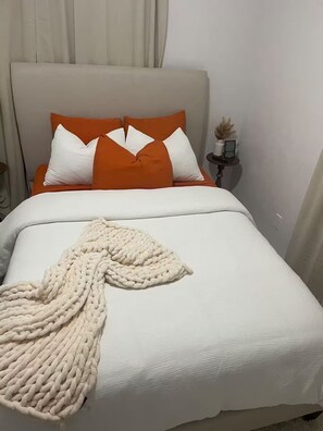Fer et planche à repasser, draps fournis