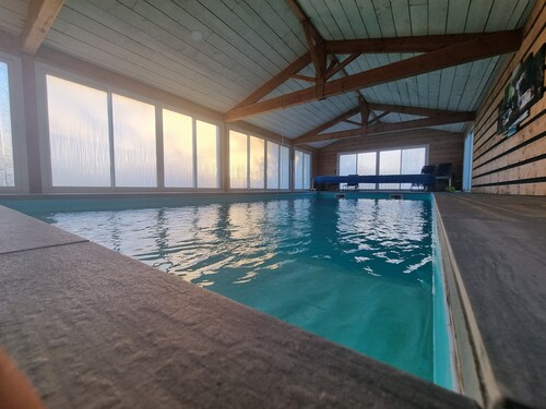 Chambre d’hôtes « Chambre Famille » avec piscine partagée, terrasse et climatisation