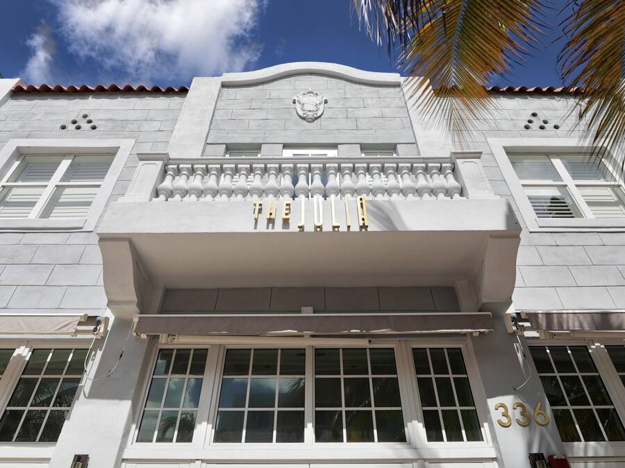 A building facade with a prominent sign reading "THE JOLIA" and the number "336" below it.