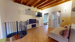Living area - Borgo Torchio F1 By Bookinggardalake (Manerba del Garda)