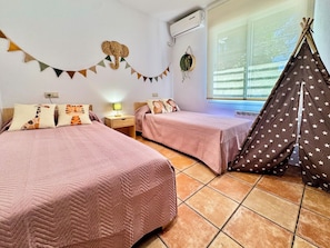 Iron/ironing board, travel crib, free WiFi, bed sheets
