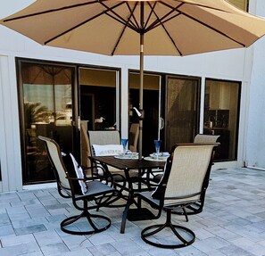 Outdoor dining - Harbor-view 1BR with sunsets, full amenities, and family-friendly space. (Panama City Beach)