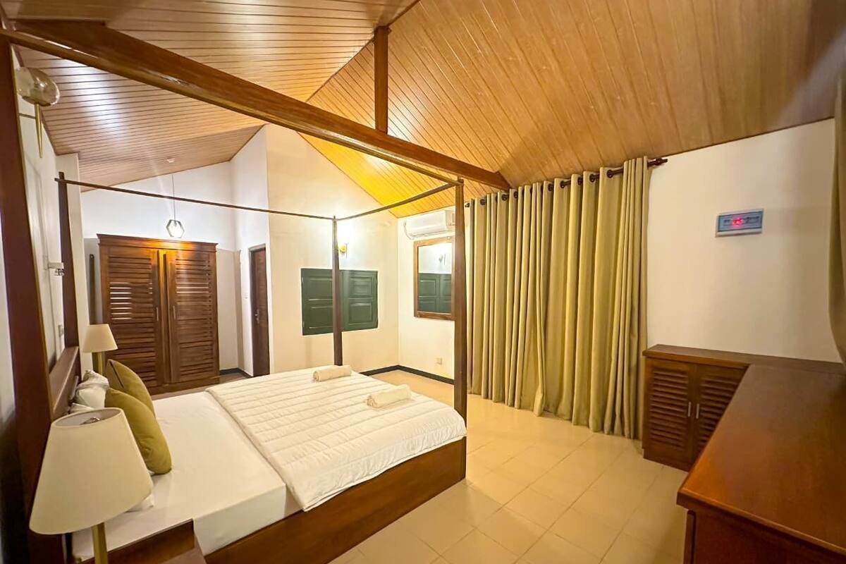 Camera Deluxe, vista giardino | Interni