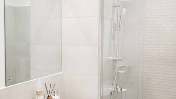 Shower, eco-friendly toiletries, towels, soap