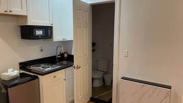 Fridge, microwave, cookware/dishes/utensils