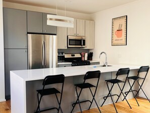 Fridge, microwave, oven, stovetop - Modern Home in Historic Neighborhood-10 MINUTE walk to Top Eats (Indianapolis)