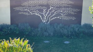 A wall mural of a stylized tree.