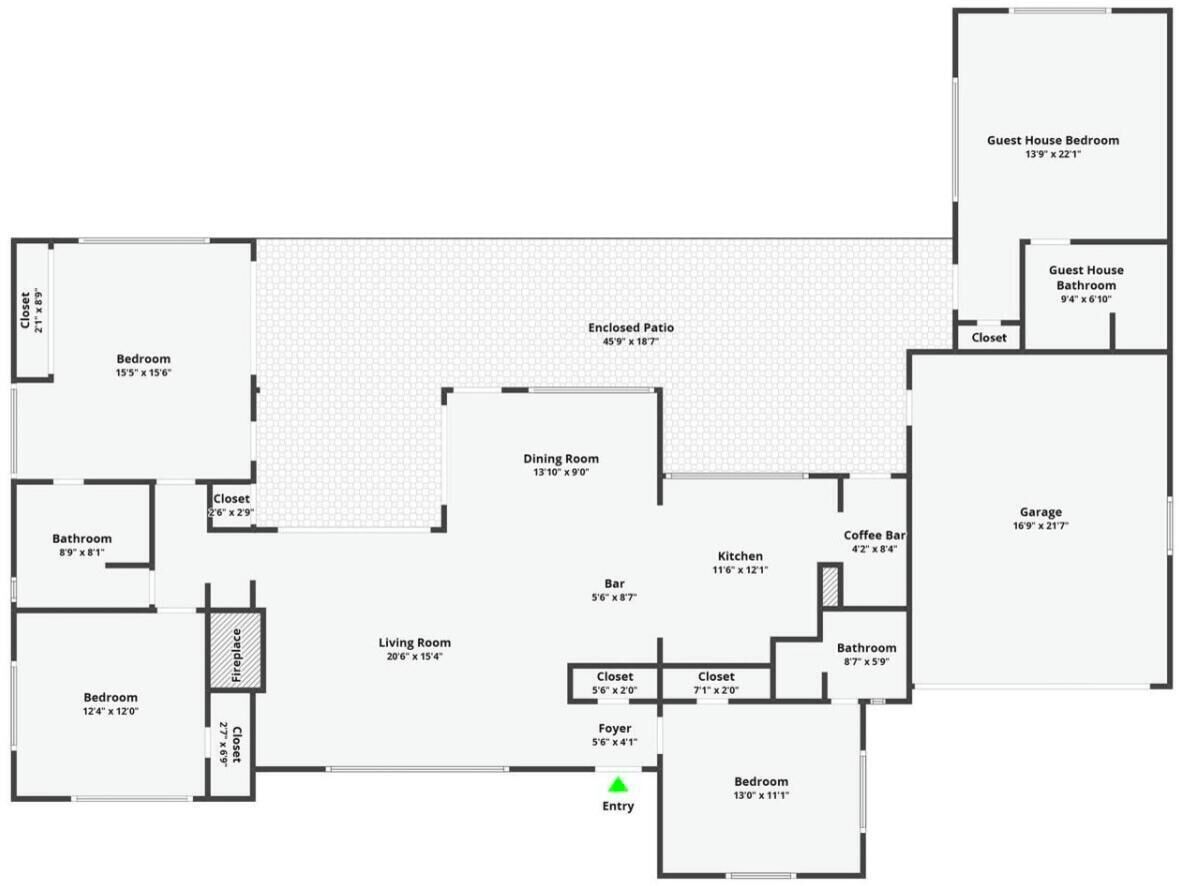 Un plan d’étage comprenant un salon, une salle à manger, une cuisine, une chambre d’amis, une salle de bain pour les invités, un garage et plusieurs chambres.