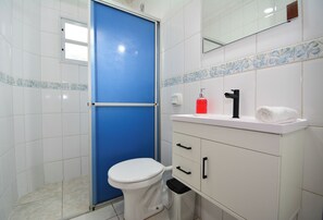 Shower, towels, soap, toilet paper