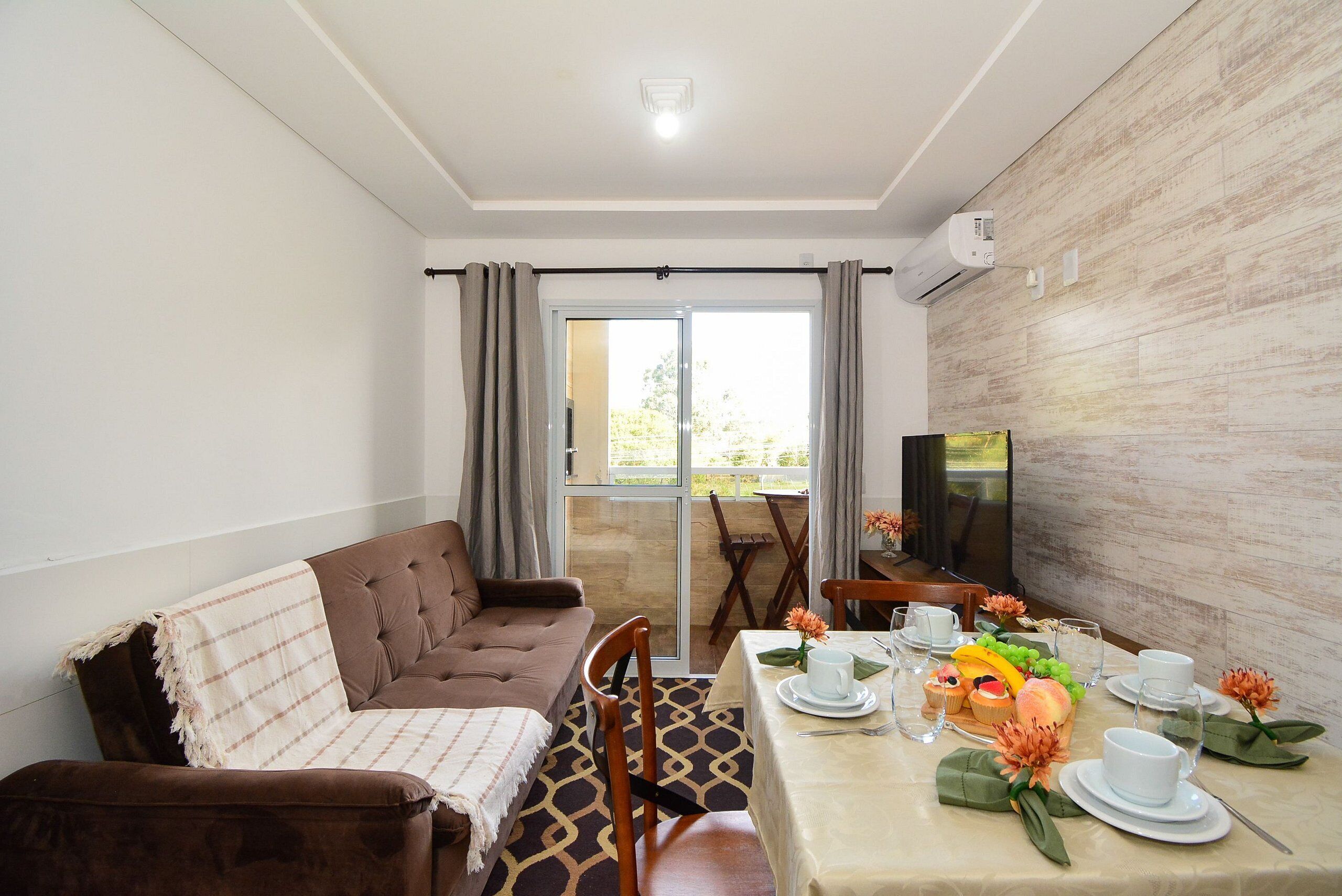 Apartamento | Área de estar | TV