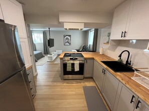 Microwave, oven, stovetop, coffee/tea maker - Bright & Cozy Basement Suite – Perfect for Work or Adventure (Fort Saskatchewan)