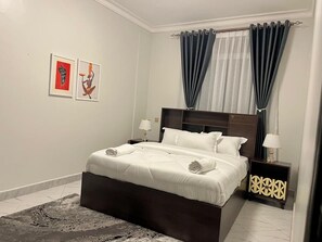Iron/ironing board, free WiFi, bed sheets - Luxurious Fully furnished 2-bedroom apartment in Kampala for your Comfy stay (Kampala)
