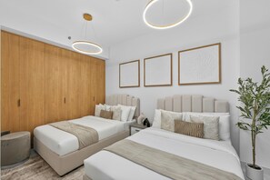 Deluxe Apartment, Balcony, City View | In-room safe, blackout drapes, iron/ironing board, free WiFi - Radiant Boulevard by DVH Luxe Retreats (Abu Dhabi)