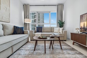 Deluxe Apartment, Balcony, City View | Living area