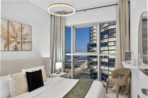Deluxe Apartment, Balcony, City View | In-room safe, blackout drapes, iron/ironing board, free WiFi - Radiant Boulevard by DVH Luxe Retreats (Abu Dhabi)