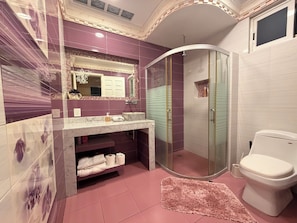 Jetted tub, towels, soap, toilet paper