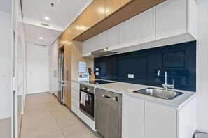 Fridge, stovetop, dishwasher, toaster - 1 Bedroom Winter Garden (Belconnen)