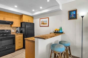 Enjoy coffee or cocktails at the seated bar NAP-A24 - Napili Point | Oceanfront 3 BR, Sleeps 12 | Car Incl. w/ 6+ Nights | NAP ML-2579 by KBM (Lahaina)