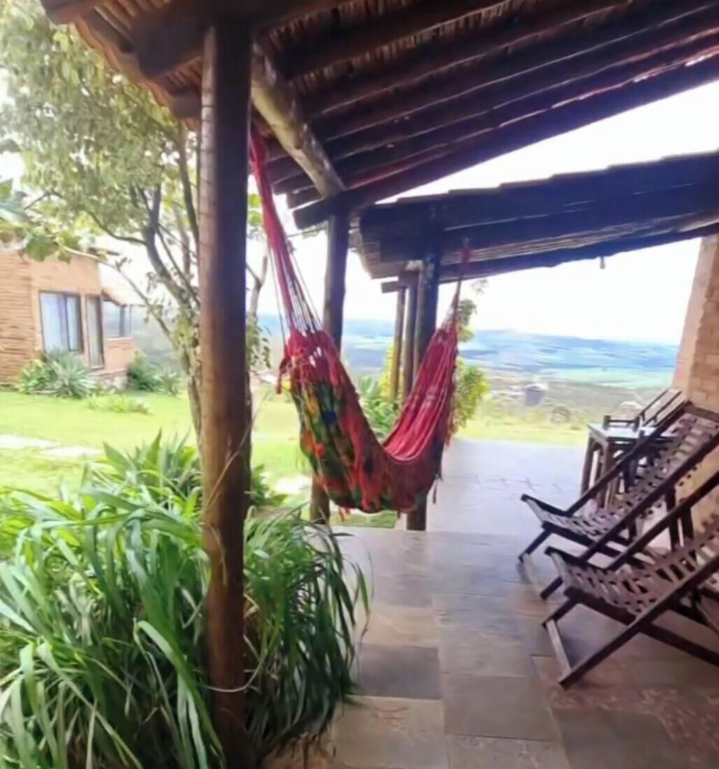 Suíte luxo, varanda coberta, vista para a montanha | Terraço/pátio